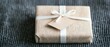 © LittleDreamStocks - Minimalist gift wrapping with linen fabric, white ribbon, and calligraphy tags