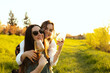 © martina87 - Beautiful girls drinking wine at sunset