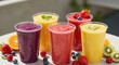 © IbragimovN - Colorful assortment of fresh fruit smoothies with berries and kiwi