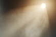 © masud - Golden beam of light illuminating ethereal smoke, creating a dramatic and atmospheric effect