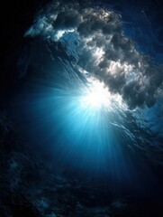 Poster - Underwater view of wave breaking with sun rays shining through the water surface in a tropical ocean environment