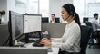 © Rhallyson - Customer service representative working in call center office with dual monitors and headset support is ready on transparent background