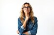 © Vadym - Young woman wearing glasses thinks about idea. Blond hair, denim jacket, index finger touches lips. Isolated white background. Beautiful person contemplates a solution.