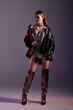 © Bliss - Elegant woman showcases castle core fashion in a striking pose within a dreamy setting