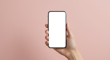 Hand holding smartphone with blank screen against pink background