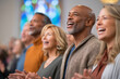 © Artificial South - A diverse group of people of varying ages singing together in what appears to be a church, with stained glass in the background