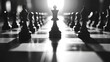 © Raul - Chess pieces stand prominently on a checkered board illuminated by bright light coming from the background!