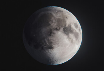  Crescent Moon in Dark Space: A mesmerizing view of the moon's partially illuminated surface, showcasing its craters and textured landscape against the backdrop of a starless night sky.