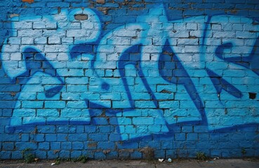 Leinwandbilder - Blue brick wall covered in graffiti art. Urban street art with blue, white spray paint design. Grunge texture, rough weathered surface. Modern creative design.