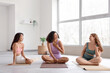 © Pixel-Shot - Sporty body positive women laughing at gym