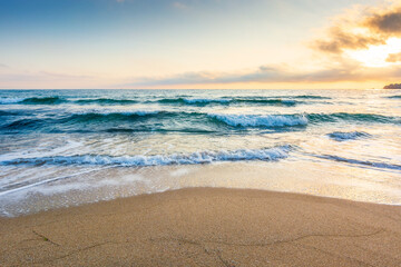 Wall Mural - empty beach in the forenoon. wet seashore. beautiful landscape at the black sea. waves washing the s