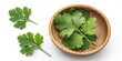© NKFrame - Fresh Cilantro Leaves in Wooden Bowl, Herbal Garnish, Cooking Ingredient. Cilantro, Herb