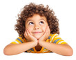 © Alice a. - Curly haired boy with cheerful expression, resting his chin on his hands, gazing upwards. He wears striped yellow and white shirt, exuding sense of wonder and curiosity