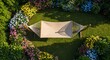 © Zhanna - Hammock set up in colorful garden surrounded by blooming flowers