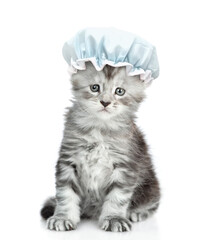 Aufkleber - Funny Maine coon kitten with shower cap on it head sits in front view and looks at camera. isolated on white background