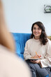 © Andrii Zastrozhnov - Young caucasian female therapist counsels patient in comfortable office setting