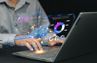Artificial intelligence and data analysis concept. Businessman using AI-powered technology to process big data, generate insights, Futuristic digital transformation in finance and business.