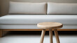 © PixxStudio - wooden table in front of grey settee in modern simple interior minimal design