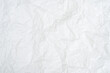 © nathamag11 - Top view and full frame of wrinkled or crumpled white paper texture used as crumpled white paper background texture in decorative art work