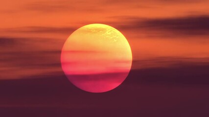 Wall Mural - stunning sunset with vibrant sun and colorful clouds creates serene evening sky, blending warm hues 