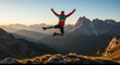 © SULTAN - Man jumping with arms raised in mountain landscape during daytime with clear sky and distant mountains