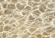 © hits - Calm, shallow water with light reflecting, creating a rippled, sandy-beige texture
