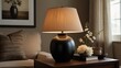 © Rahmat - Table lamp with linen shade on wooden side table in a living room