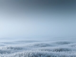 Naklejka na meble Misty winter landscape depicting frost covered grass and soft blue hues in the morning