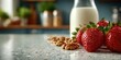 © AnuStudio - Fresh strawberries, walnuts, and a bottle of milk on a kitchen countertop, evoking a healthy breakfast or snack.