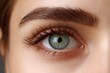 © Dzikrul Husnani - Stunning Green Eye Close-Up:  Luminous Gaze, Defined Brows, Lush Lashes