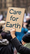 © StephanK - Environmental Protection Concept with Balloon and 'Care for Earth' Sign – Eco Responsibility, Sustainability, Climate Hope Symbolic Image
