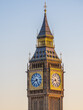 © oldmn - Big Ben clock tower glowing in golden sunset light, London