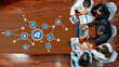 © InfiniteFlow - A business team engages in a collaborative meeting analyzing key performance indicators using charts and digital tools to strategize and enhance productivity. Amity