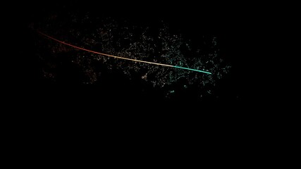 Wall Mural - curving green and cyan glitter lines colliding with each other against black background slow motion