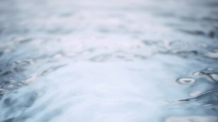 Wall Mural - super slow motion detail shot of waving clear water surface at 1000fps.