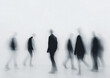 © LouLou - Blurred silhouettes of people walking in minimalist white space with motion blur effect, representing modern life, isolation, identity, urban anonymity and conceptual art photography themes