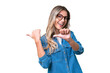 © luismolinero - Young Uruguayan woman over isolated background pointing to the side to present a product