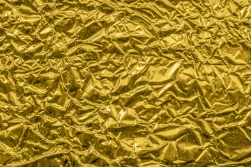 Wall Mural - luxury shiny metallic golden foil crumpled texture background