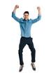 © Viorel Sima - excited casual man with fists above head jumping up and smiling