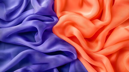 Wall Mural - vibrant purple and orange satin fabric draped elegantly with soft folds and textured pattern
