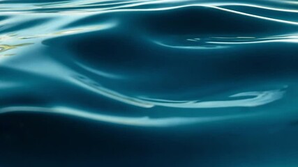 Wall Mural - Serene Reflection of Calm Water Waves Tranquil Blue Surface with Gentle Ripples Evoking Natures Peace and Relaxation