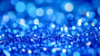 © Fatema - Sapphire glitter bokeh background with shimmering royal blue sparkle and crystal light effects