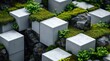 © Tabs - Geometric concrete cubes, layered with moss and greenery, creating an abstract landscape