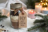 Homemade hot cocoa mix in a festive glass jar