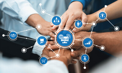 Poster - A visual representation of teamwork and collaboration in a business environment showcasing hands joined together with icons for enterprise resource planning and connectivity. Amity