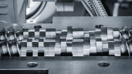 Poster - Metal spiral shafts are part of a machine or tool. Concept of precision and engineering.