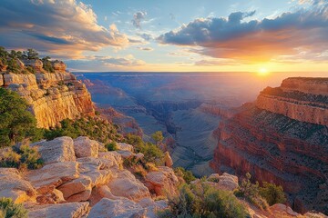 Poster - Sunrise over the Grand Canyon showcases vibrant colors and dramatic cliffs in the early morning light as shadows shift across the majestic landscape