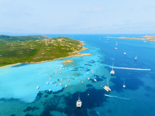 Wall Mural - island in the middle of the sea. drone view of a yachts, boats and island. vacationing people. north