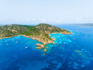 Wall Mural - island in the middle of the sea. drone view of a yachts, boats and island. vacationing people. north
