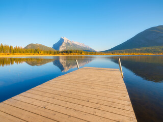 Wall Mural - vermilion lakes. banff national park, alberta, canada. reflections on the surface of the water. pier